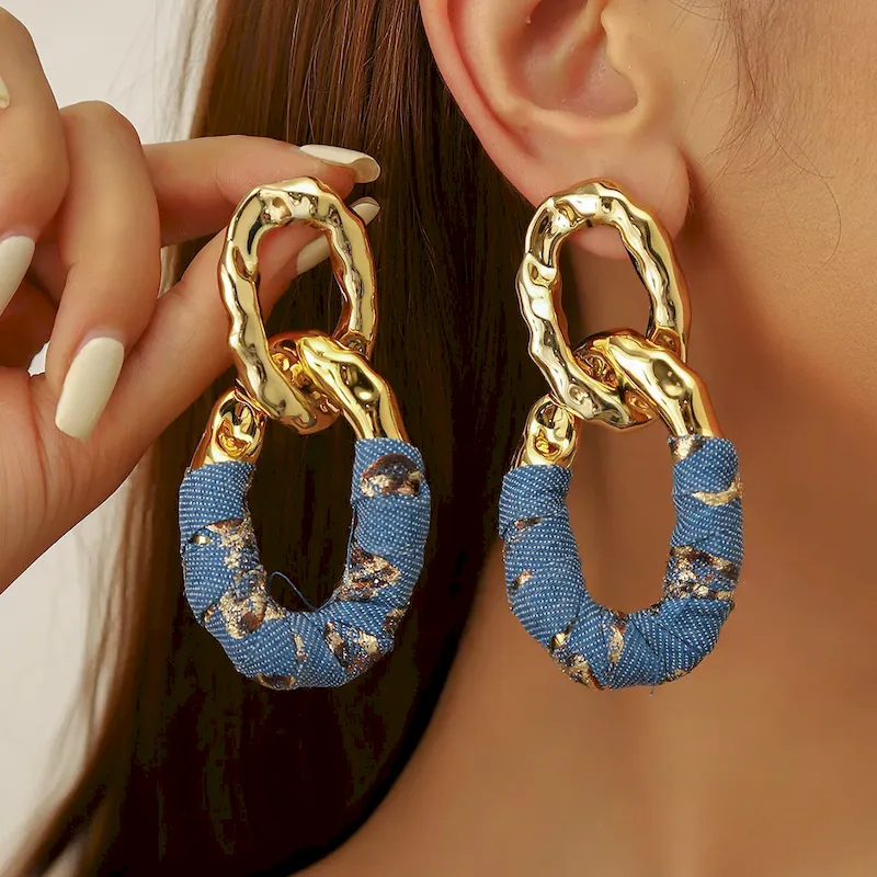 Wholesale Women Fashion Exaggerated Pleated Oval Faux Leather Wrap Denim Earrings - Image 11