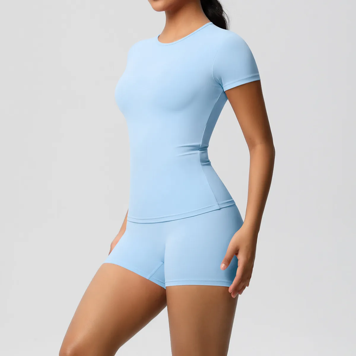 Women Fashion Casual Solid Color Short-Sleeve T-Shirt Tight Shorts Yoga Sports Two-Piece Set - Image 13